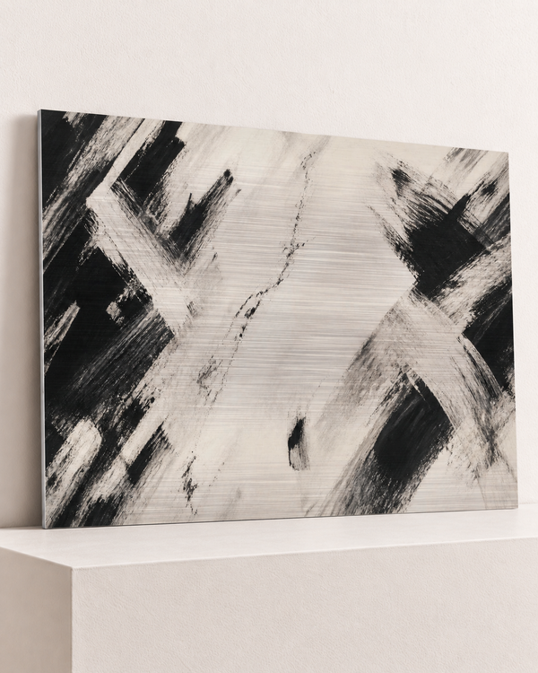 scattered-marks-brushed-aluminum-print, largest 100×70cm unframed3mm silver brushed aluminum, horizontal grain, raised warm platform, angle photograph