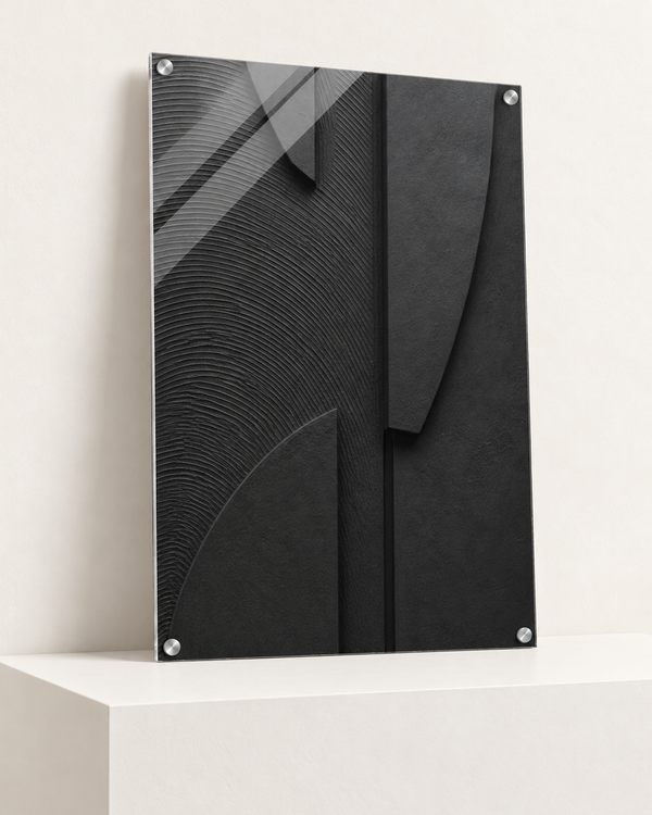 Curves in Charcoal | Acrylic Print | 70x100 cm; 4mm acrylic, four silver corner caps, resting on raised light platform — angle