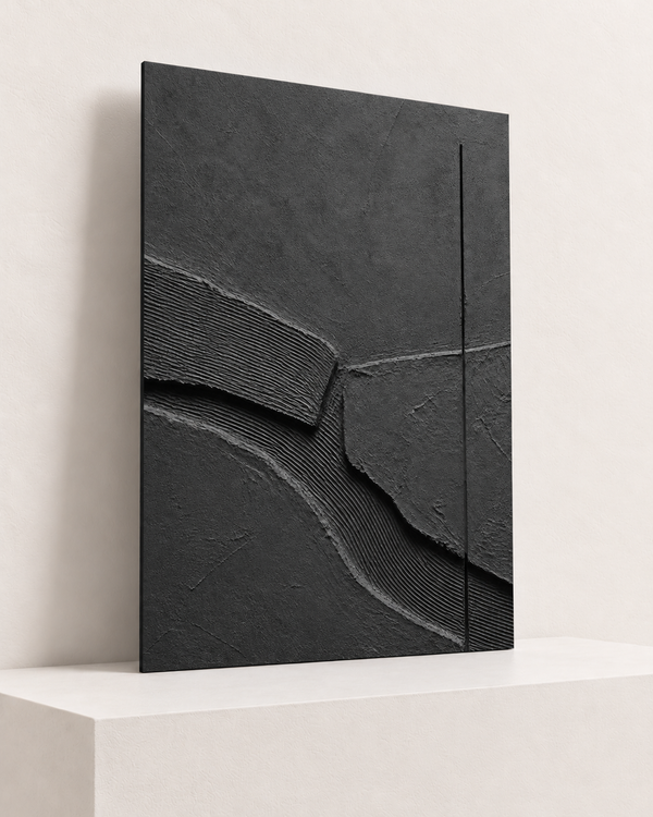 Charcoal Relief | Foam Print | 70x100 cm; 5mm black PVC foam, thin unframed cut edge, resting on raised light platform — angle
